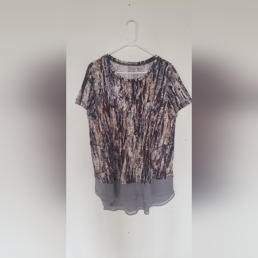 Logo by Lori Goldstein top L